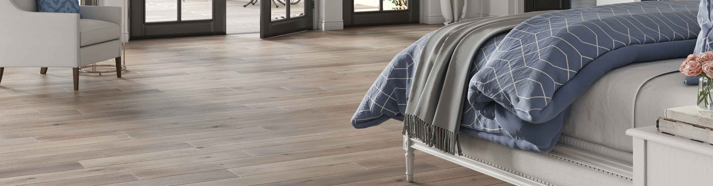 Bedroom with hardwood flooring and fireplace